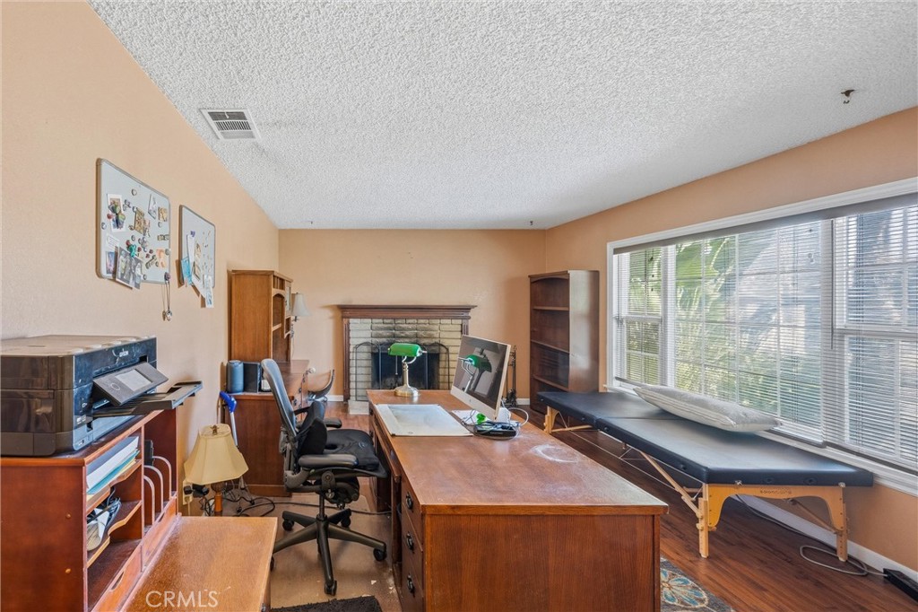 1539 Robyn Street Redlands, CA 92374 - Photo 10 of 47 a room with furniture a flat screen tv and a faucet