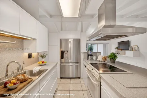 a front view of a house with a yard and potted plants