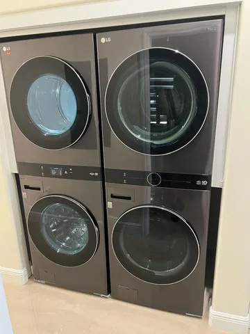 an aerial view of house with yard swimming pool and outdoor seating