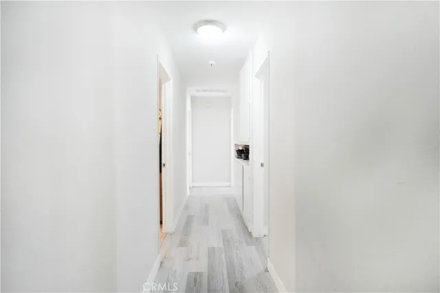 a bed room with a bed and a window