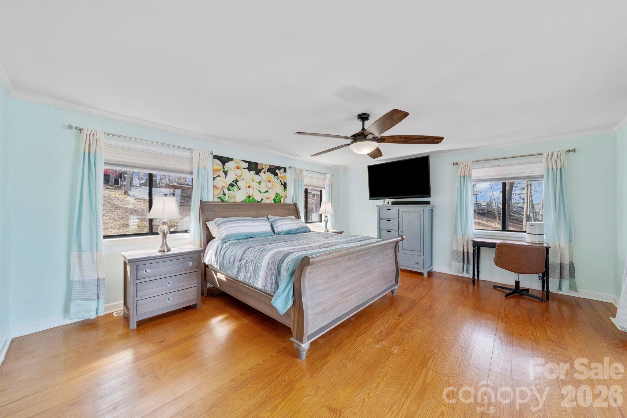 1777 Wild Turkey Road, Unit 23 Camden, SC 29020 - Photo 15 of 45 a bedroom with a bed and a desk