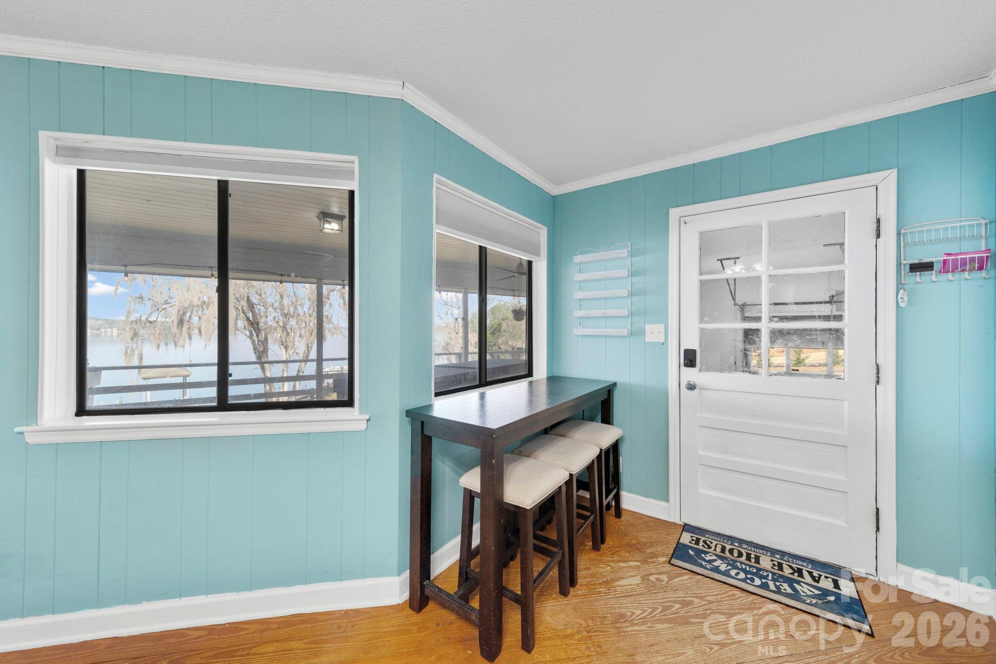 1777 Wild Turkey Road, Unit 23 Camden, SC 29020 - Photo 24 of 45 a view of a room that has a table and a chair in it