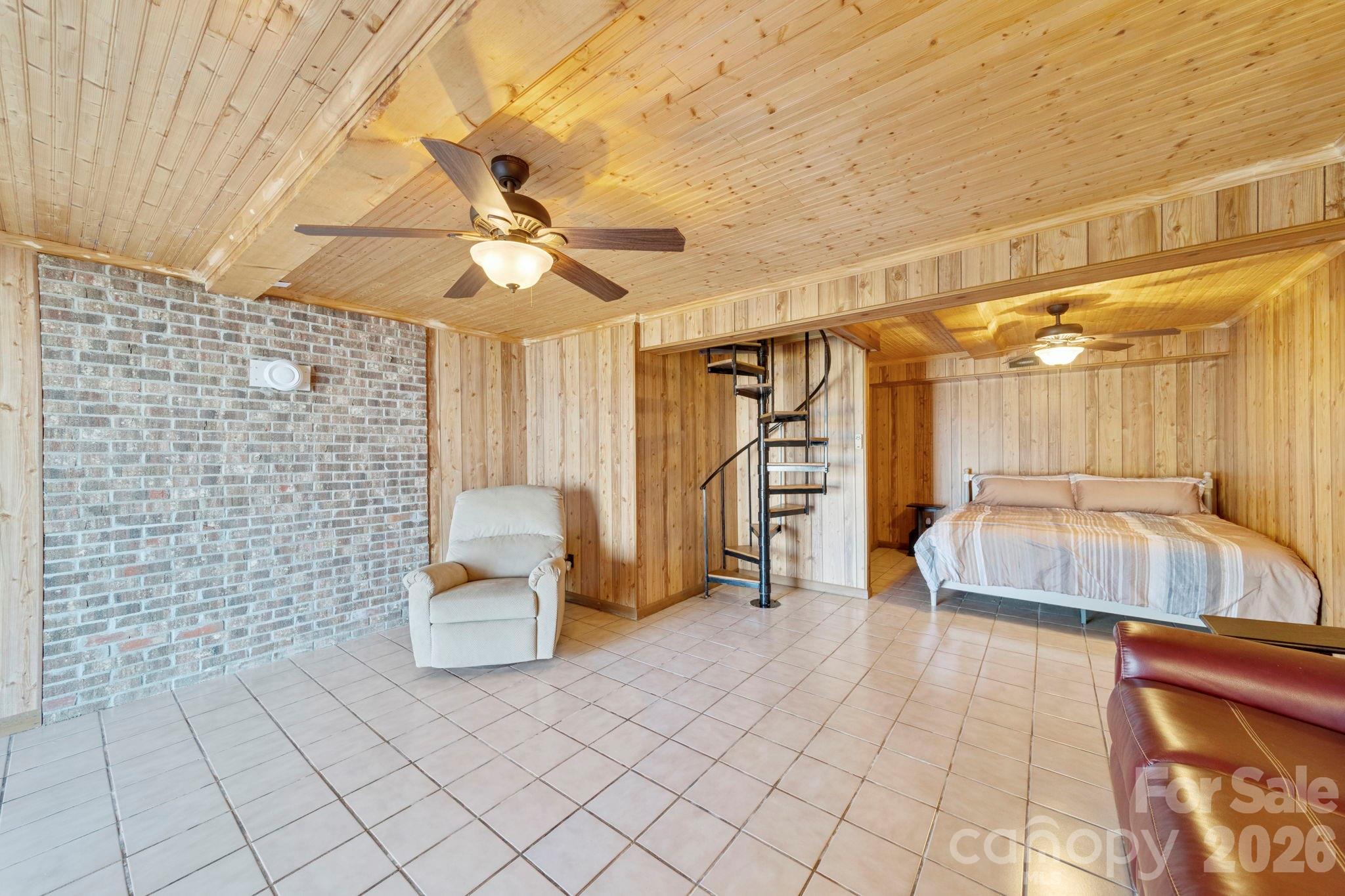 1777 Wild Turkey Road, Unit 23 Camden, SC 29020 - Photo 29 of 45 a spacious bedroom with a bed and a walk in closet