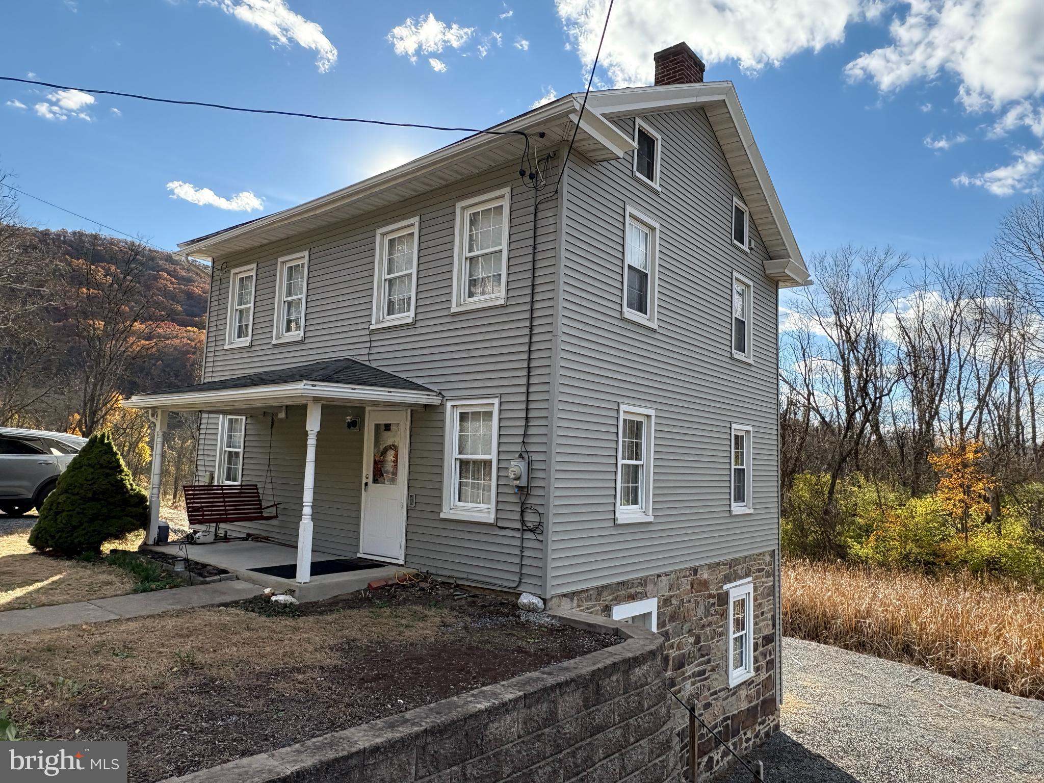 221 South Main Street Reedsville, PA 17084 - Photo 13 of 25 a front view of a house with a yard