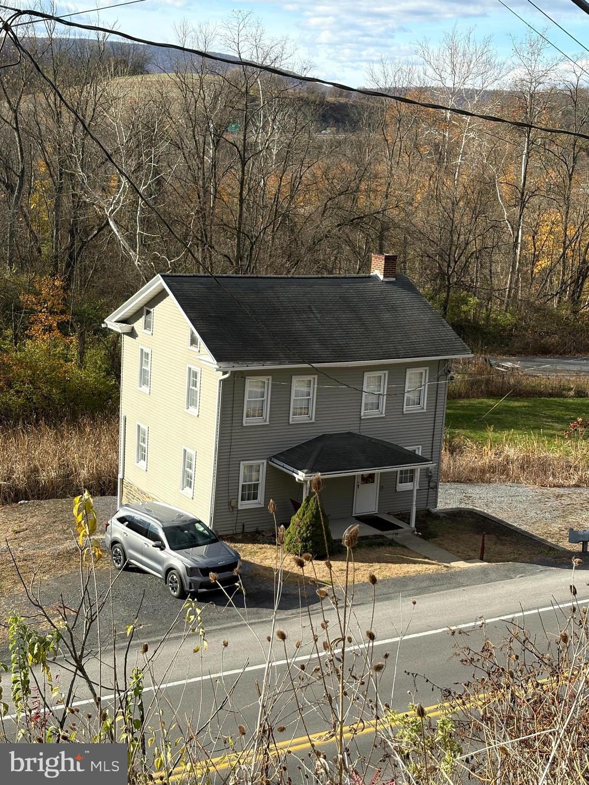 221 South Main Street Reedsville, PA 17084 - Photo 15 of 25 a front view of a house with a yard