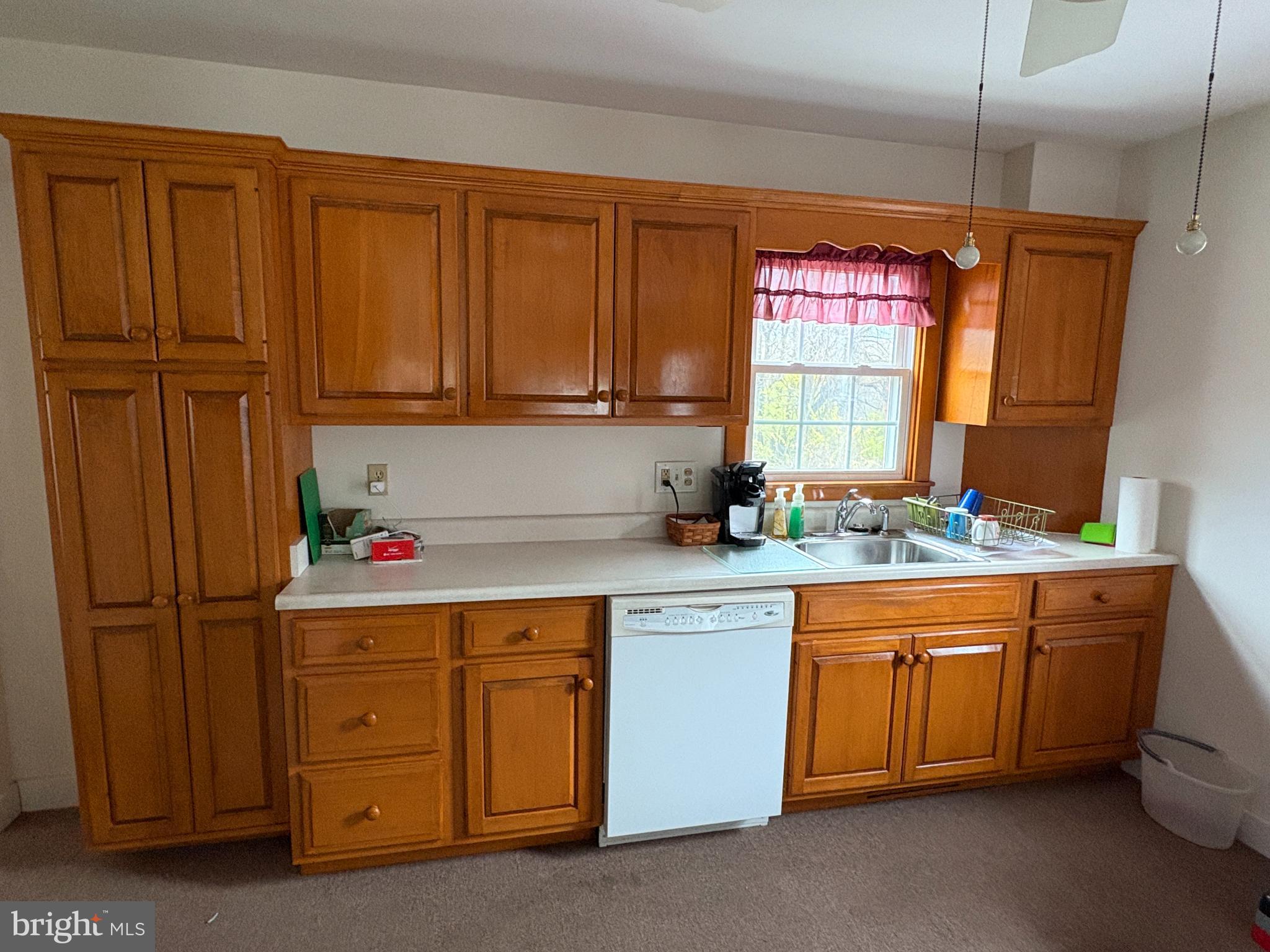 221 South Main Street Reedsville, PA 17084 - Photo 4 of 25 a kitchen with stainless steel appliances granite countertop a sink window and cabinets