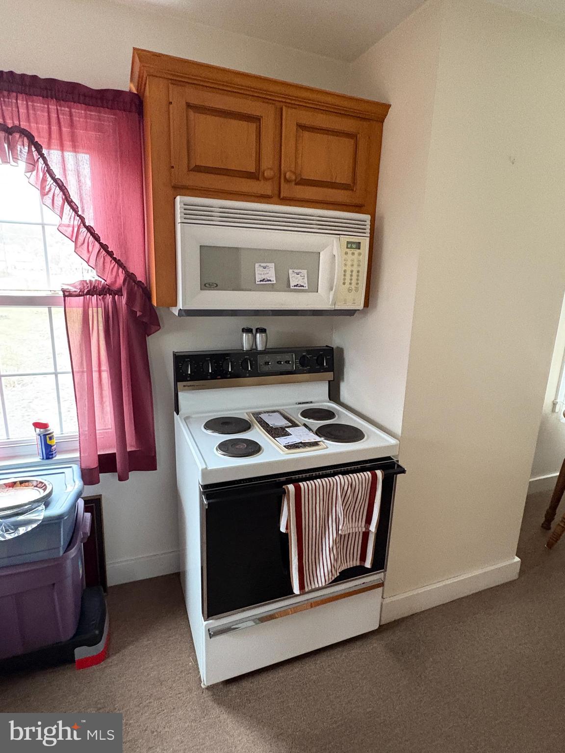 221 South Main Street Reedsville, PA 17084 - Photo 8 of 25 a stove top oven sitting inside of a kitchen