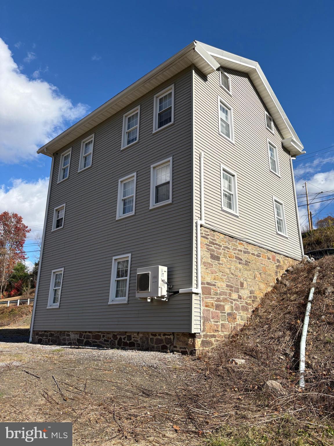 221 South Main Street Reedsville, PA 17084 - Photo 10 of 25 a front view of a house with a yard