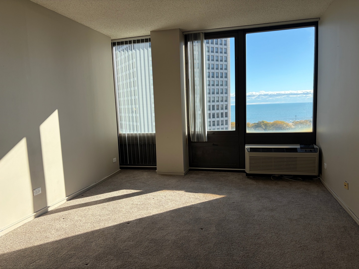 5320 North Sheridan Road, Unit 1407 Chicago, IL 60640 - Photo 18 of 21 a view of a room with a large window