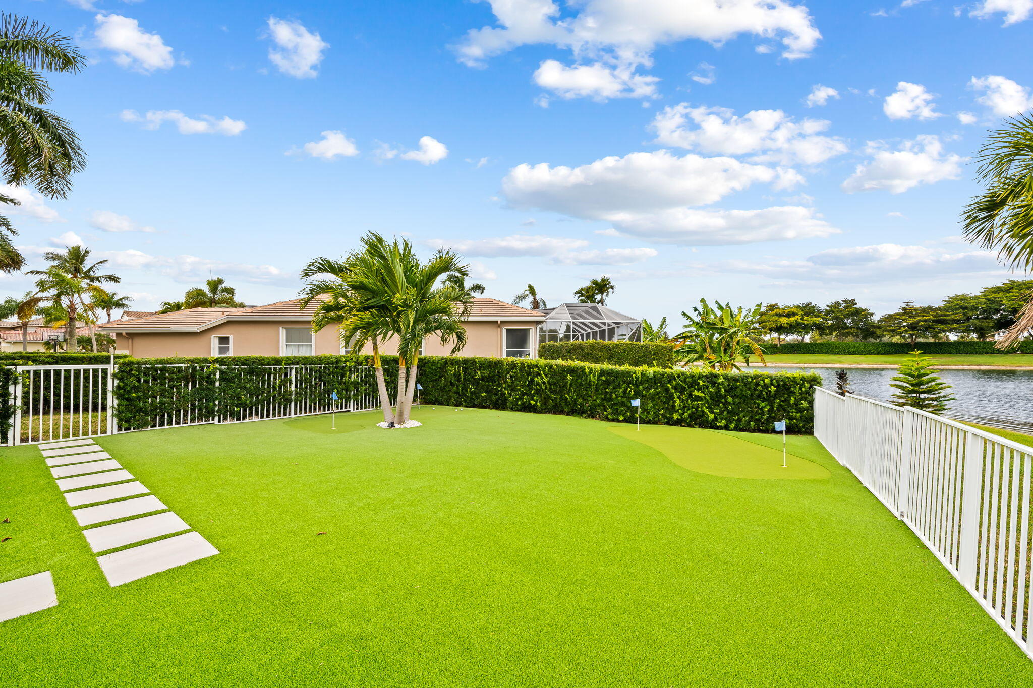 12570 Yardley Drive Boca Raton, FL 33428 - Photo 44 of 74 Backyard/Putting Green
