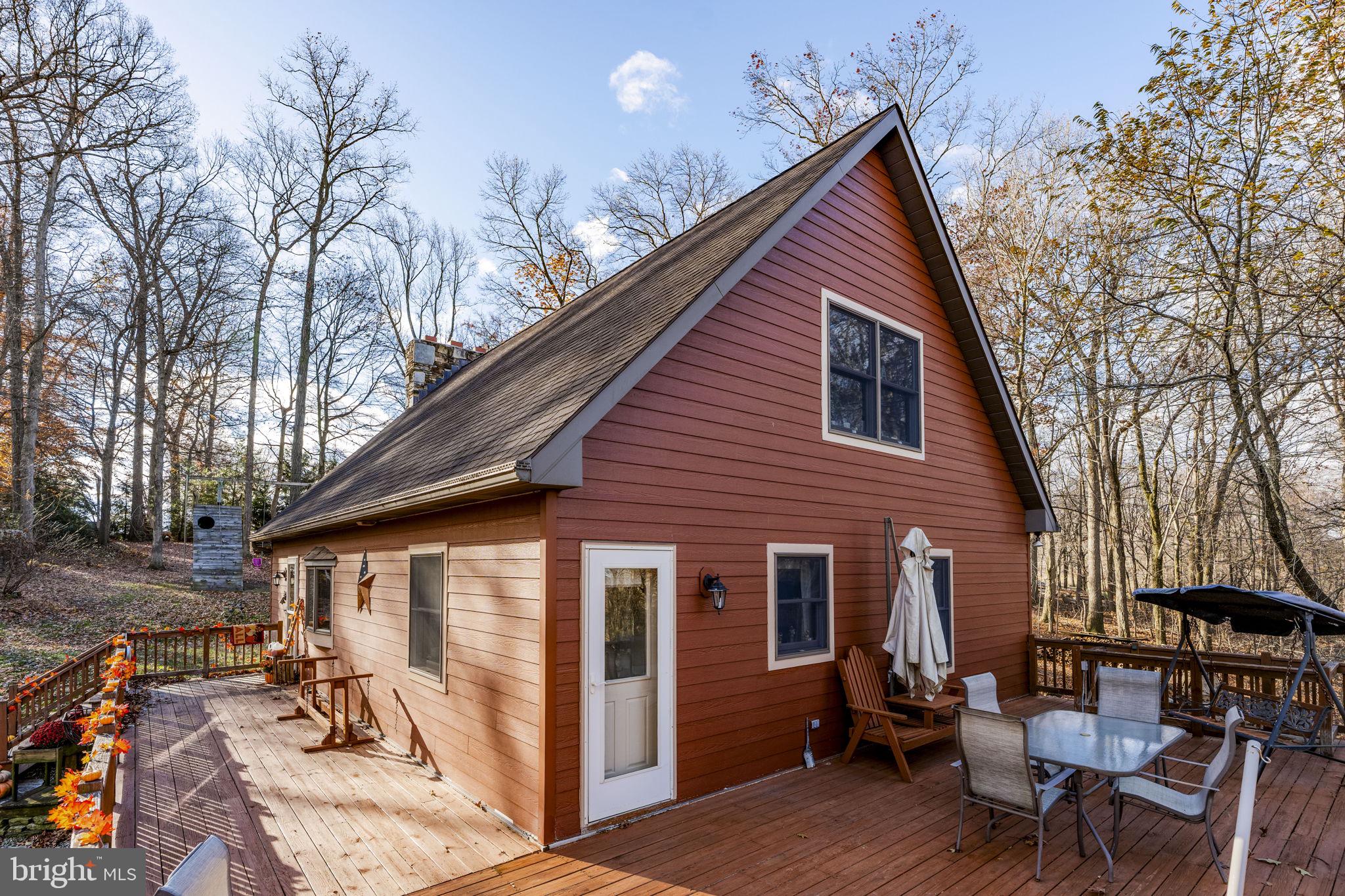35 High Street Christiana, PA 17509 - Photo 17 of 33 a backyard of a house with outdoor seating