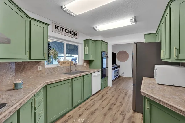 a kitchen with lots of counter space and a sink