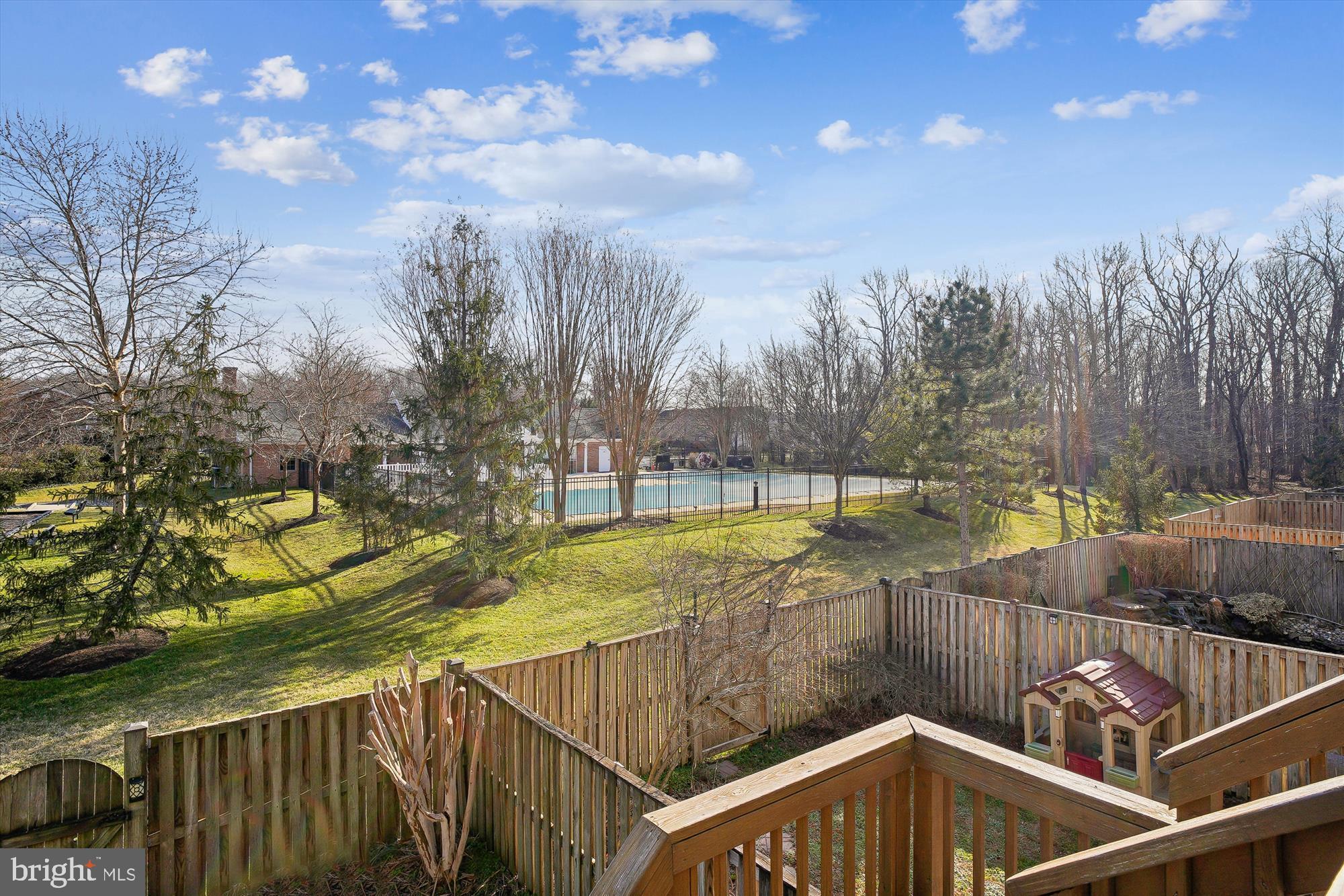 3834 Glebe Meadow Way Edgewater, MD 21037 - Photo 18 of 68 Serene backyard oasis with pool view.
