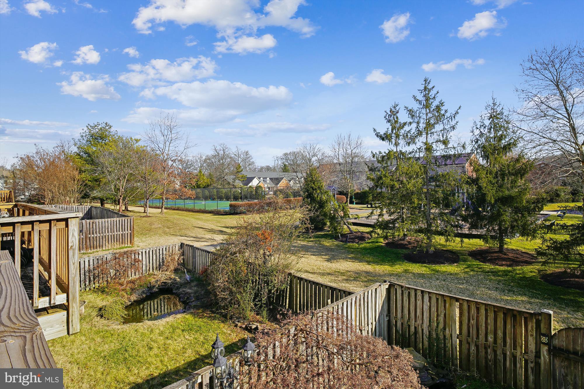 3834 Glebe Meadow Way Edgewater, MD 21037 - Photo 19 of 68 Serene backyard oasis with lush greenery.