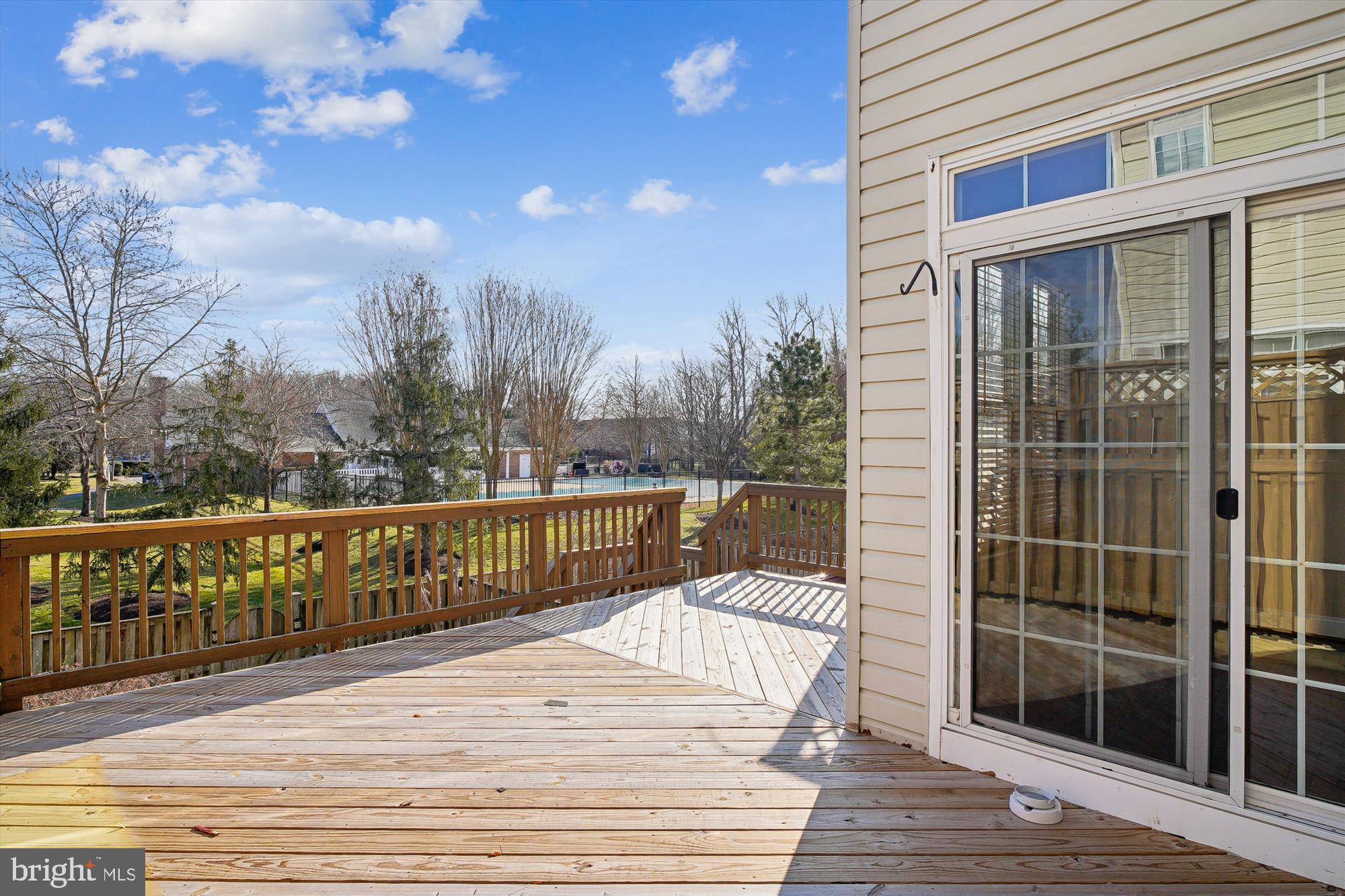 3834 Glebe Meadow Way Edgewater, MD 21037 - Photo 20 of 68 Sunny deck with serene backyard views.