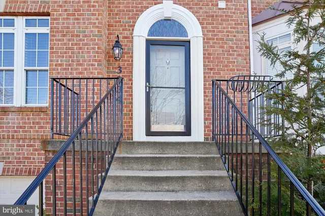 a kitchen with a sink cabinets and window