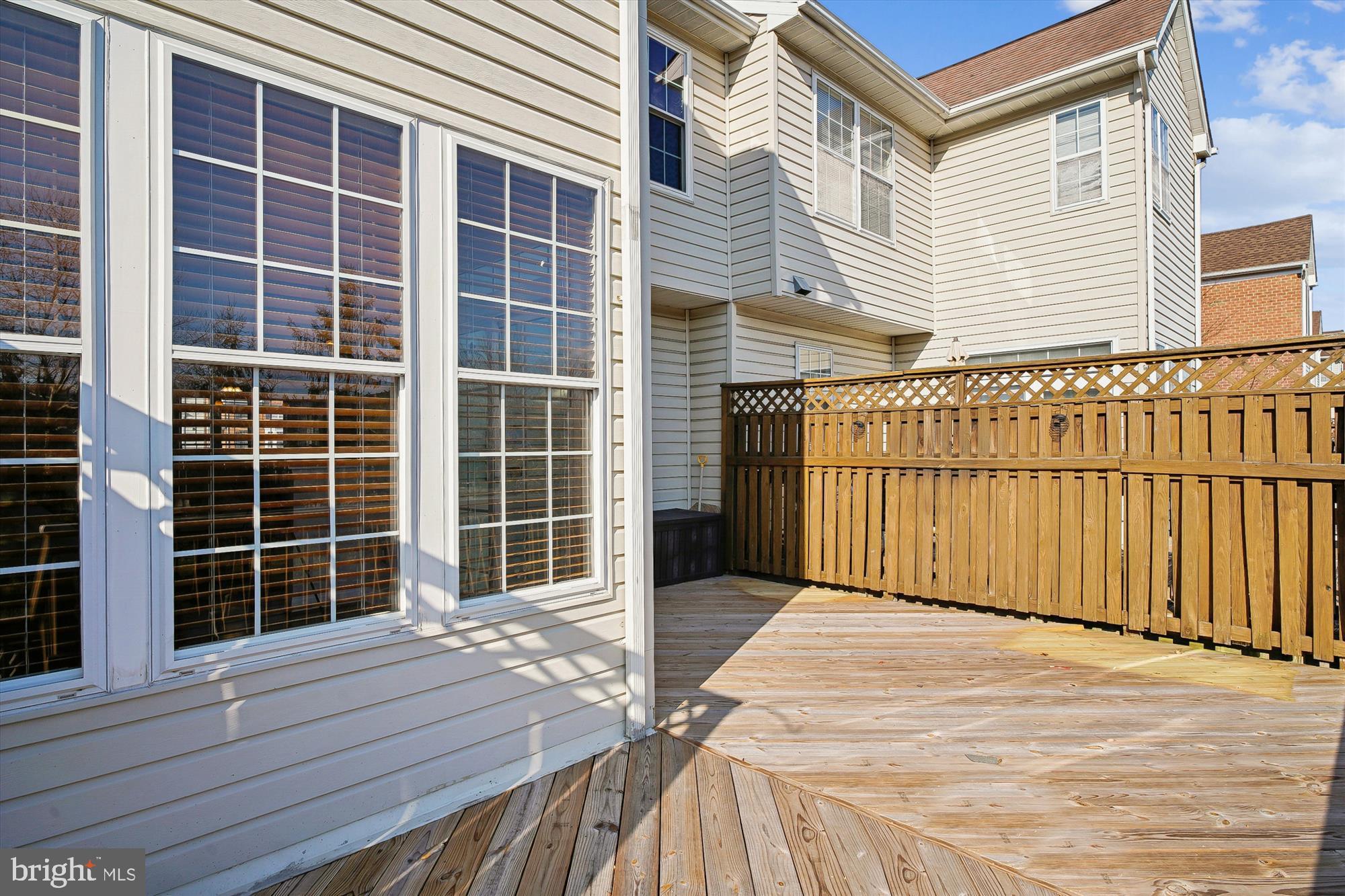 3834 Glebe Meadow Way Edgewater, MD 21037 - Photo 22 of 68 Sunny deck with charming wooden fence.