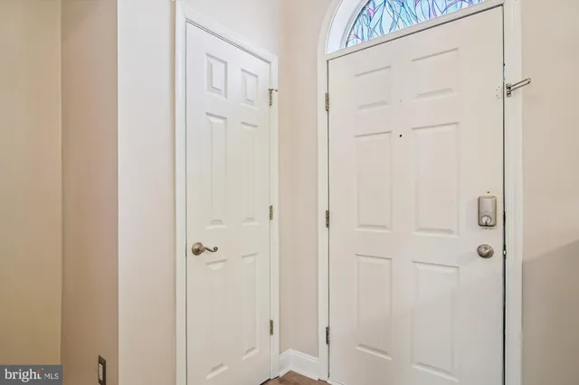 a kitchen with stainless steel appliances a stove a refrigerator and cabinets