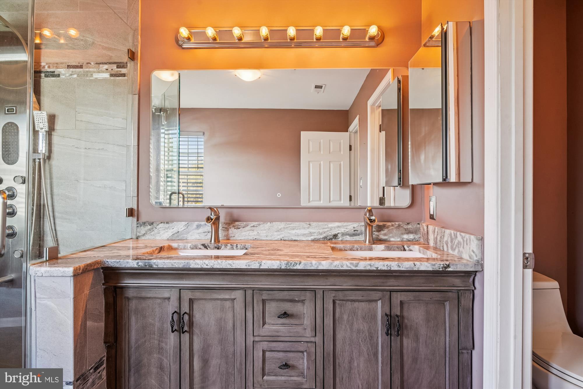 3834 Glebe Meadow Way Edgewater, MD 21037 - Photo 33 of 68 Elegant dual-sink bathroom with modern finishes.