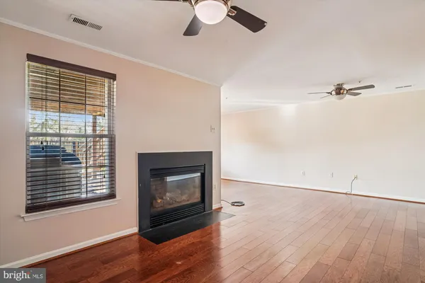 a view of a house with wooden stairs