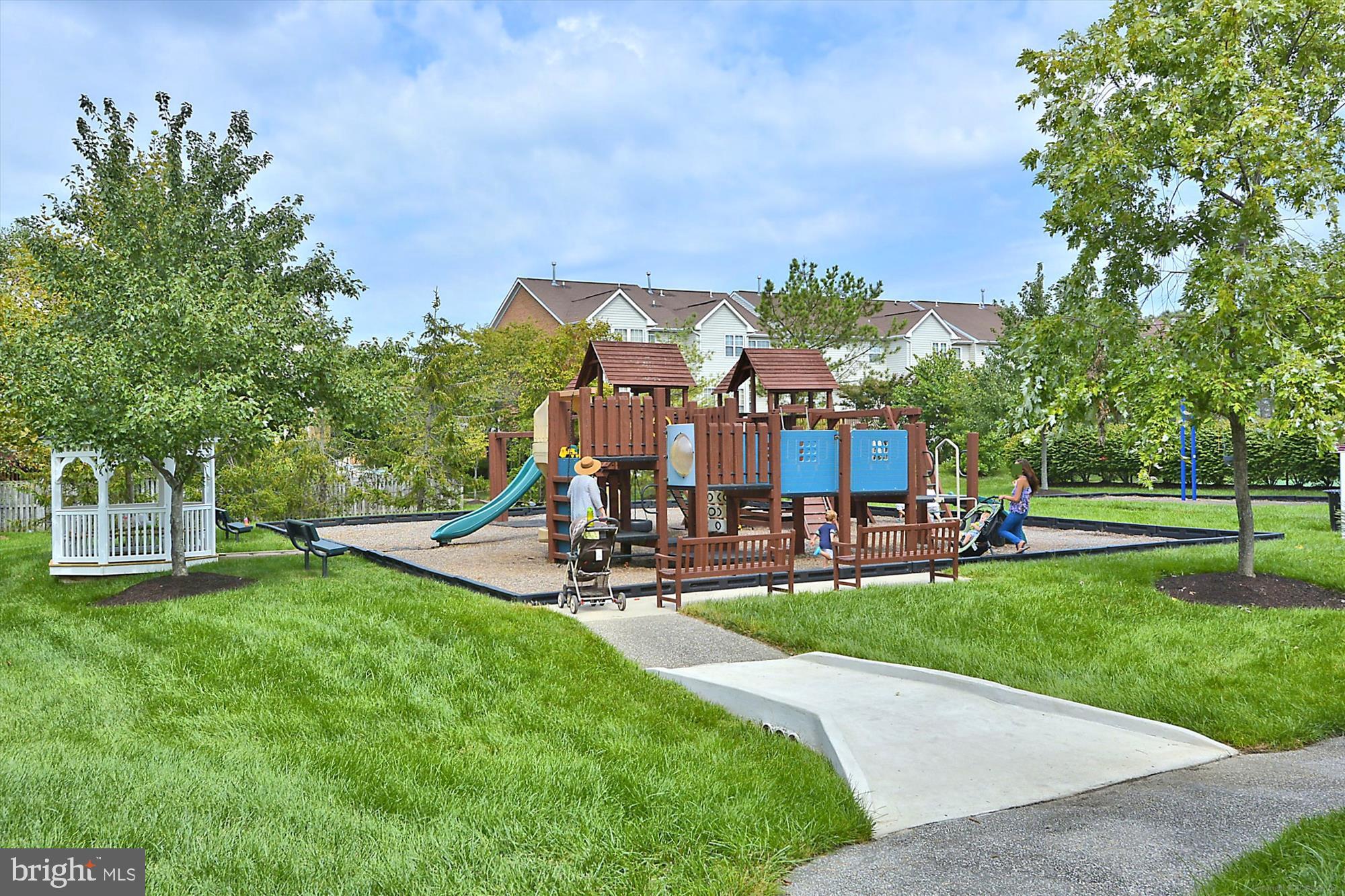3834 Glebe Meadow Way Edgewater, MD 21037 - Photo 65 of 68 Charming playground nestled in lush greenery.