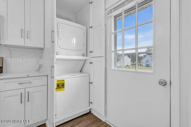a view of walk in closet with window