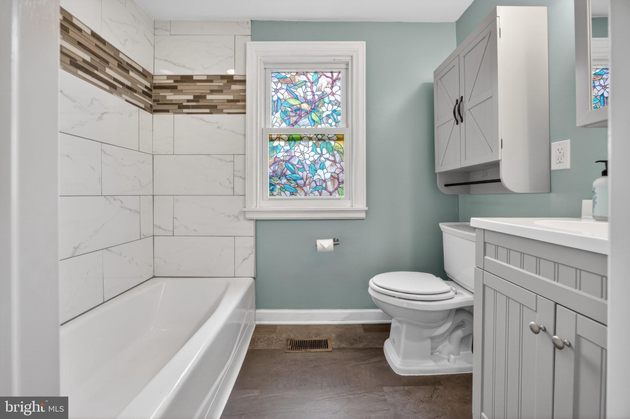 1511 Buchert Road Pottstown, PA 19464 - Photo 16 of 46 Charming bath with stained glass window.