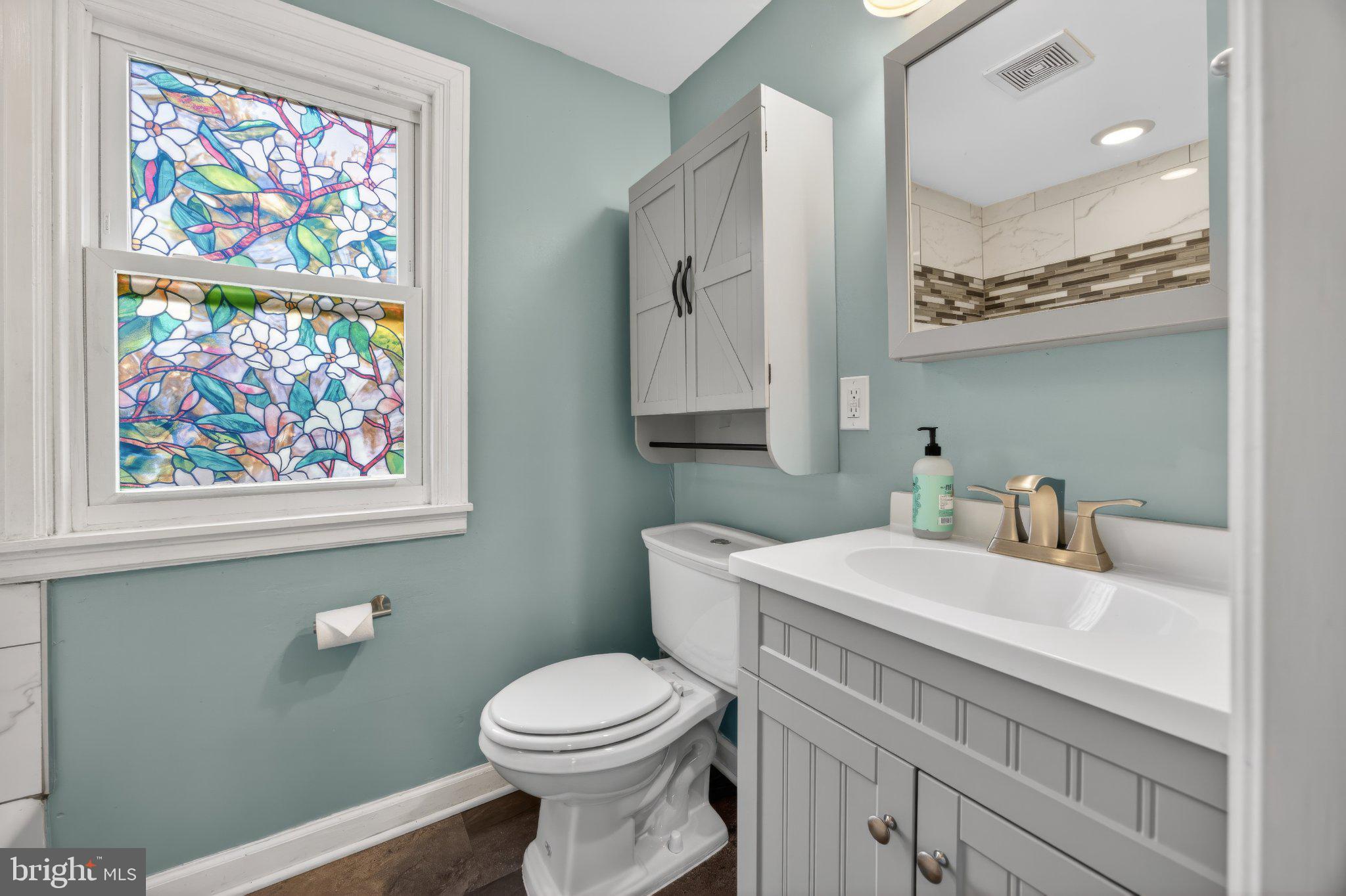 1511 Buchert Road Pottstown, PA 19464 - Photo 17 of 46 Charming bathroom with stained glass.