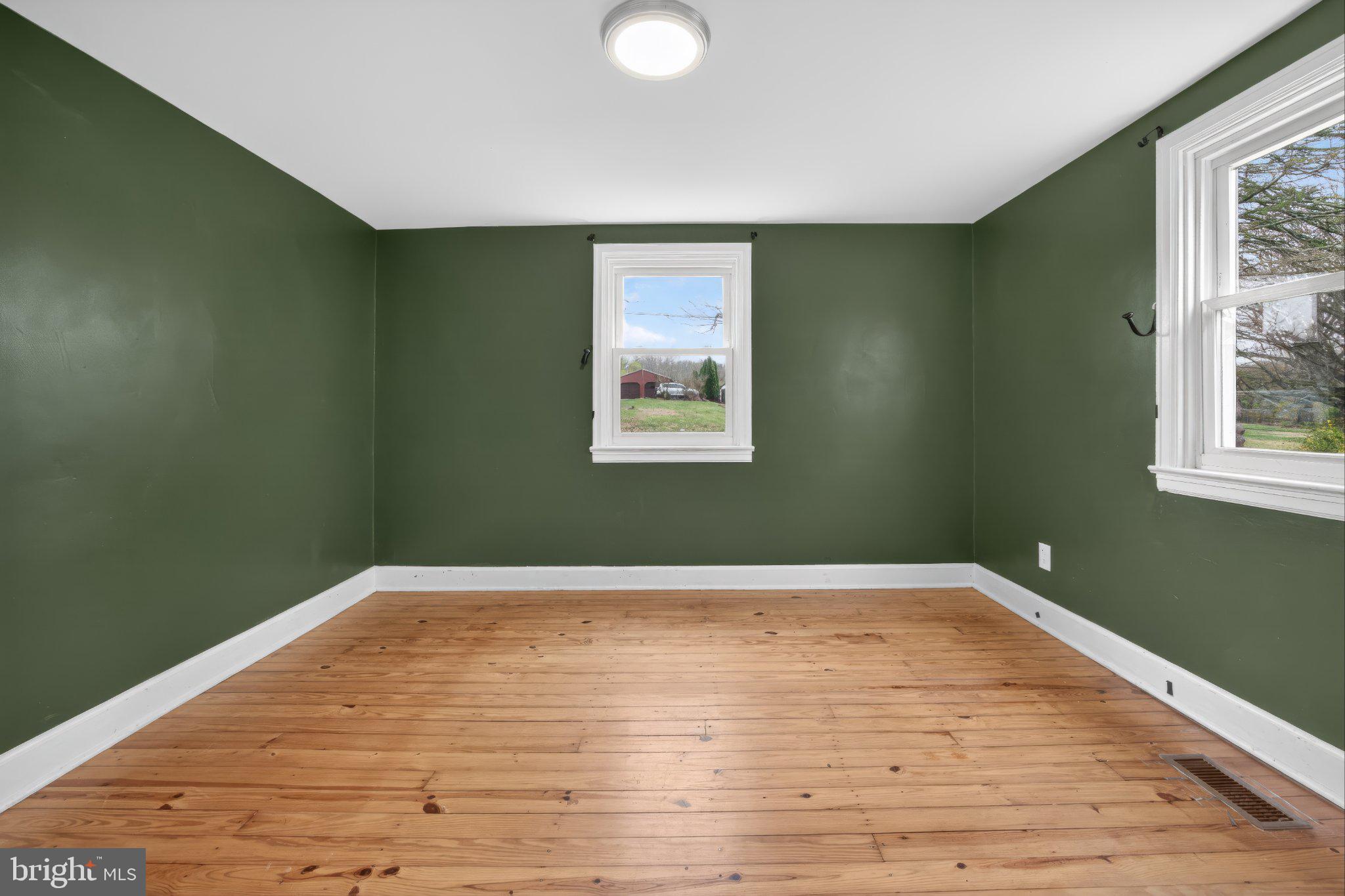 1511 Buchert Road Pottstown, PA 19464 - Photo 19 of 46 Charming green room with natural light.
