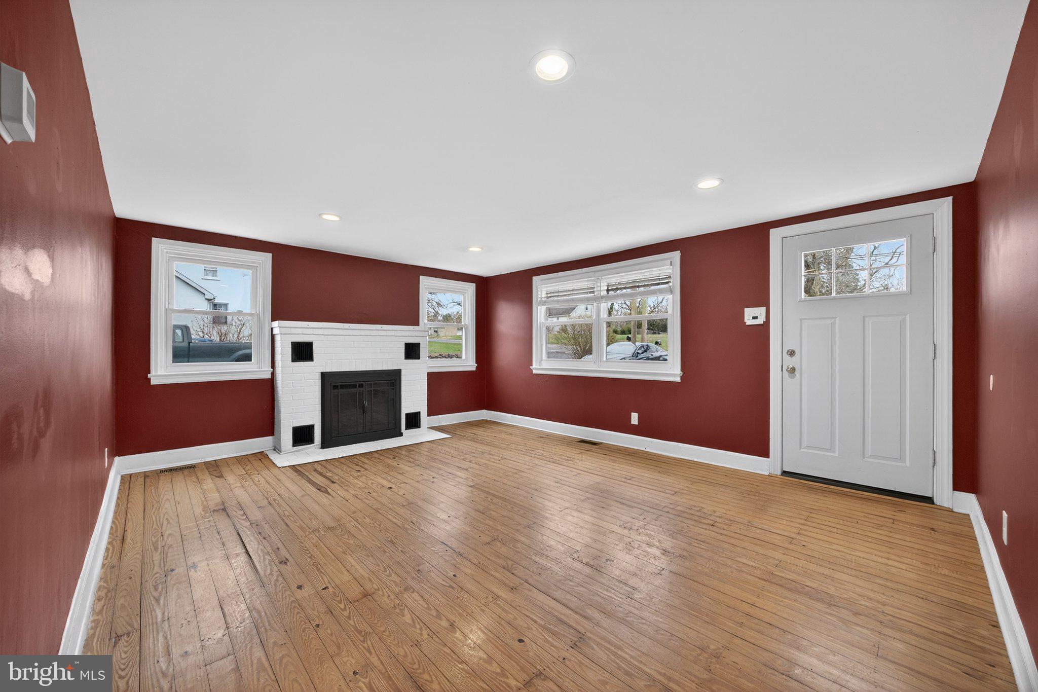 1511 Buchert Road Pottstown, PA 19464 - Photo 6 of 46 Vibrant red walls with natural light.