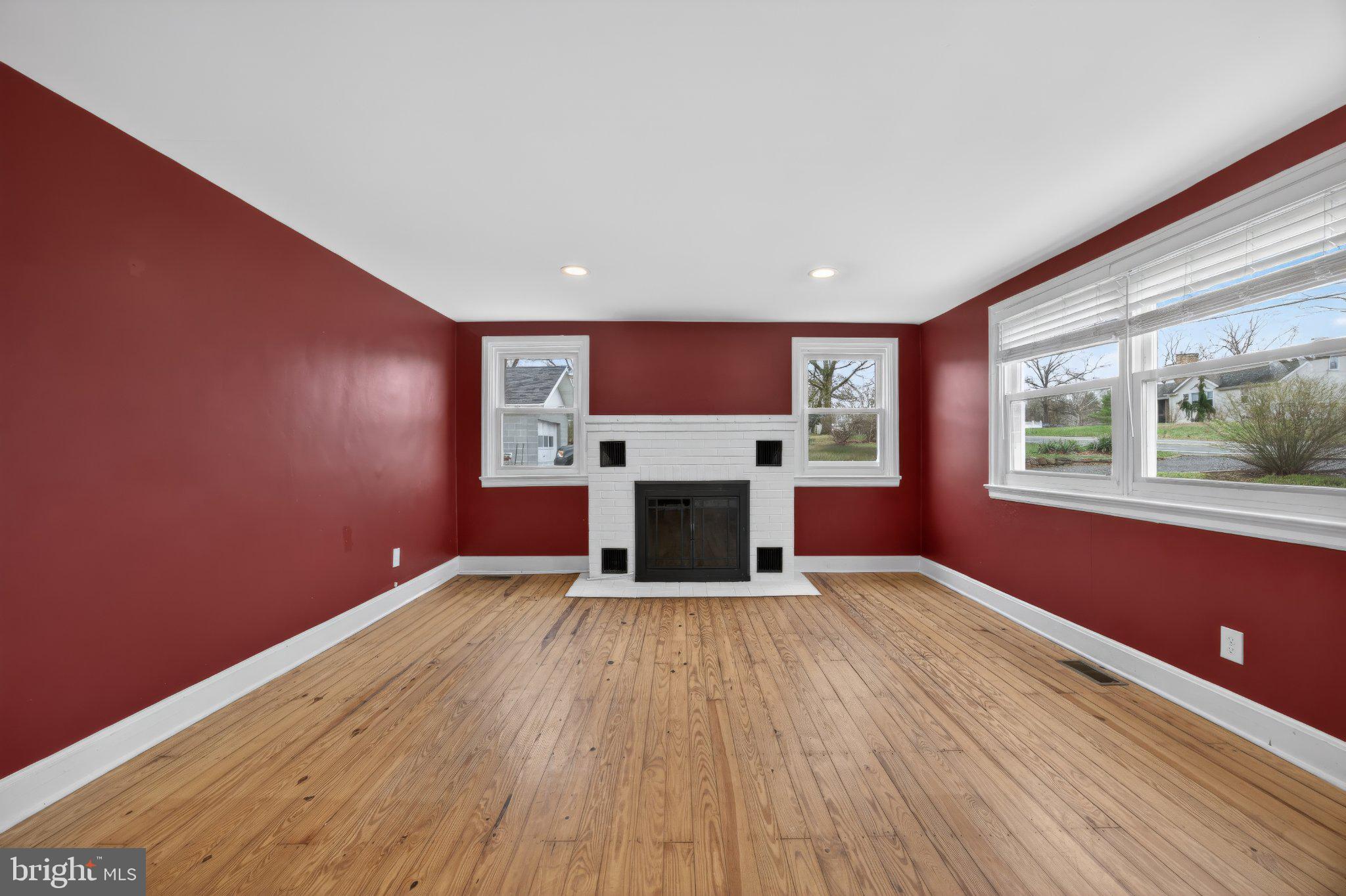1511 Buchert Road Pottstown, PA 19464 - Photo 8 of 46 Vibrant red walls enhance cozy charm.