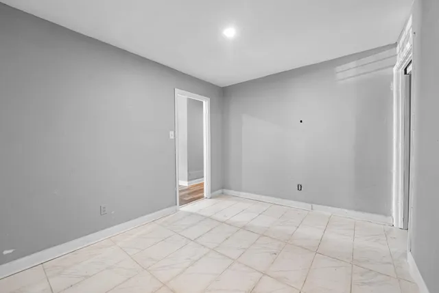 a view of kitchen with a sink and a stove top oven