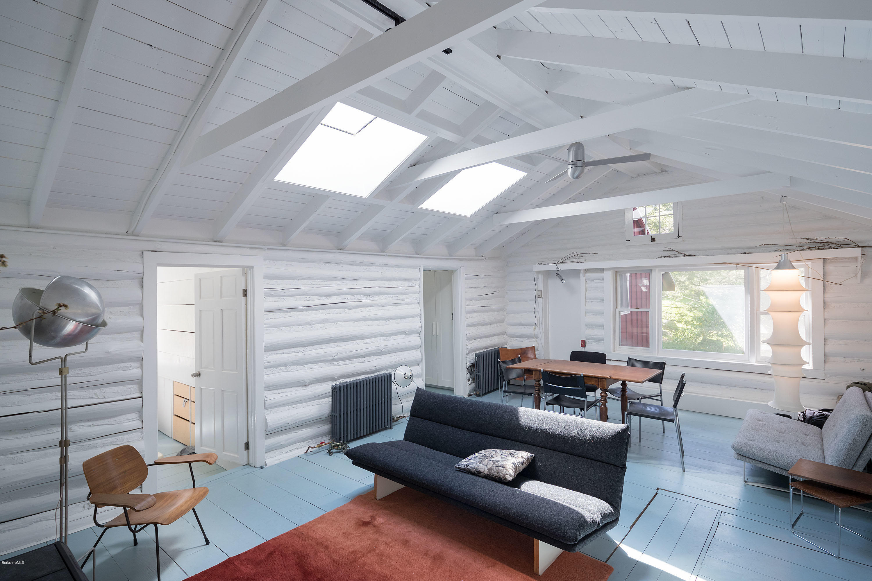 10 Tannery Road Sandisfield, MA 01255 - Photo 1 of 24 a living room with furniture and a large window