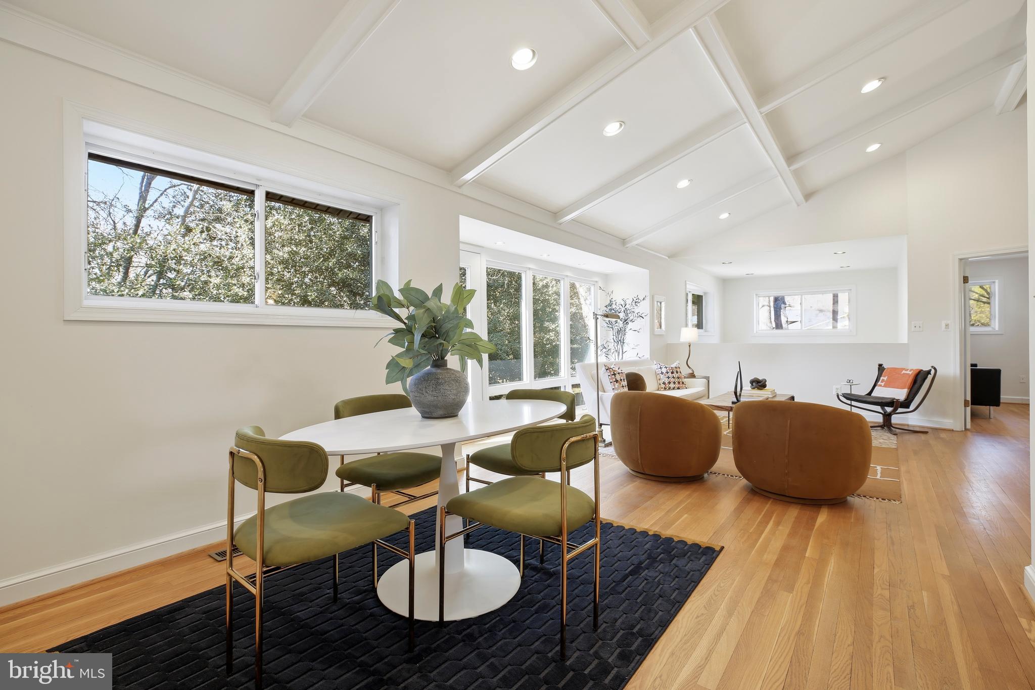 9914 Fernwood Road Bethesda, MD 20817 - Photo 11 of 61 a living room with furniture and a table