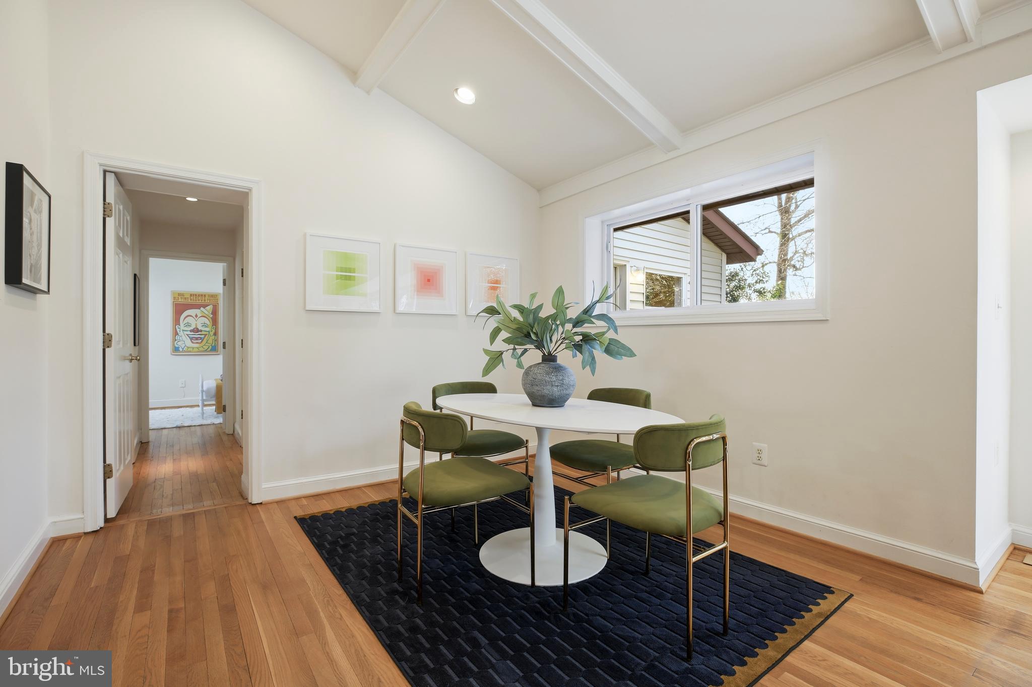 9914 Fernwood Road Bethesda, MD 20817 - Photo 12 of 61 a view of a dining room with furniture and wooden floor