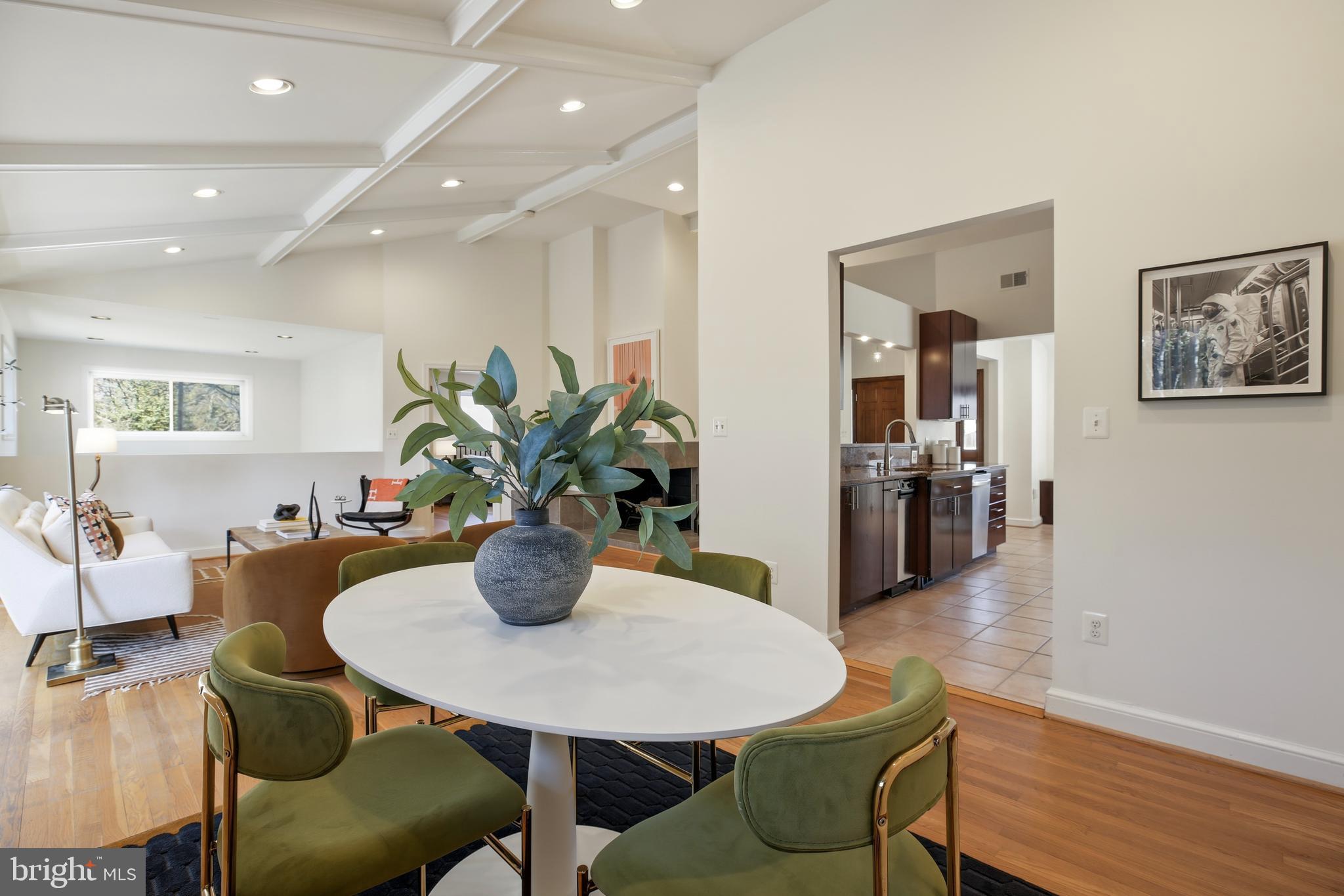 9914 Fernwood Road Bethesda, MD 20817 - Photo 13 of 61 a dining room with furniture and wooden floor
