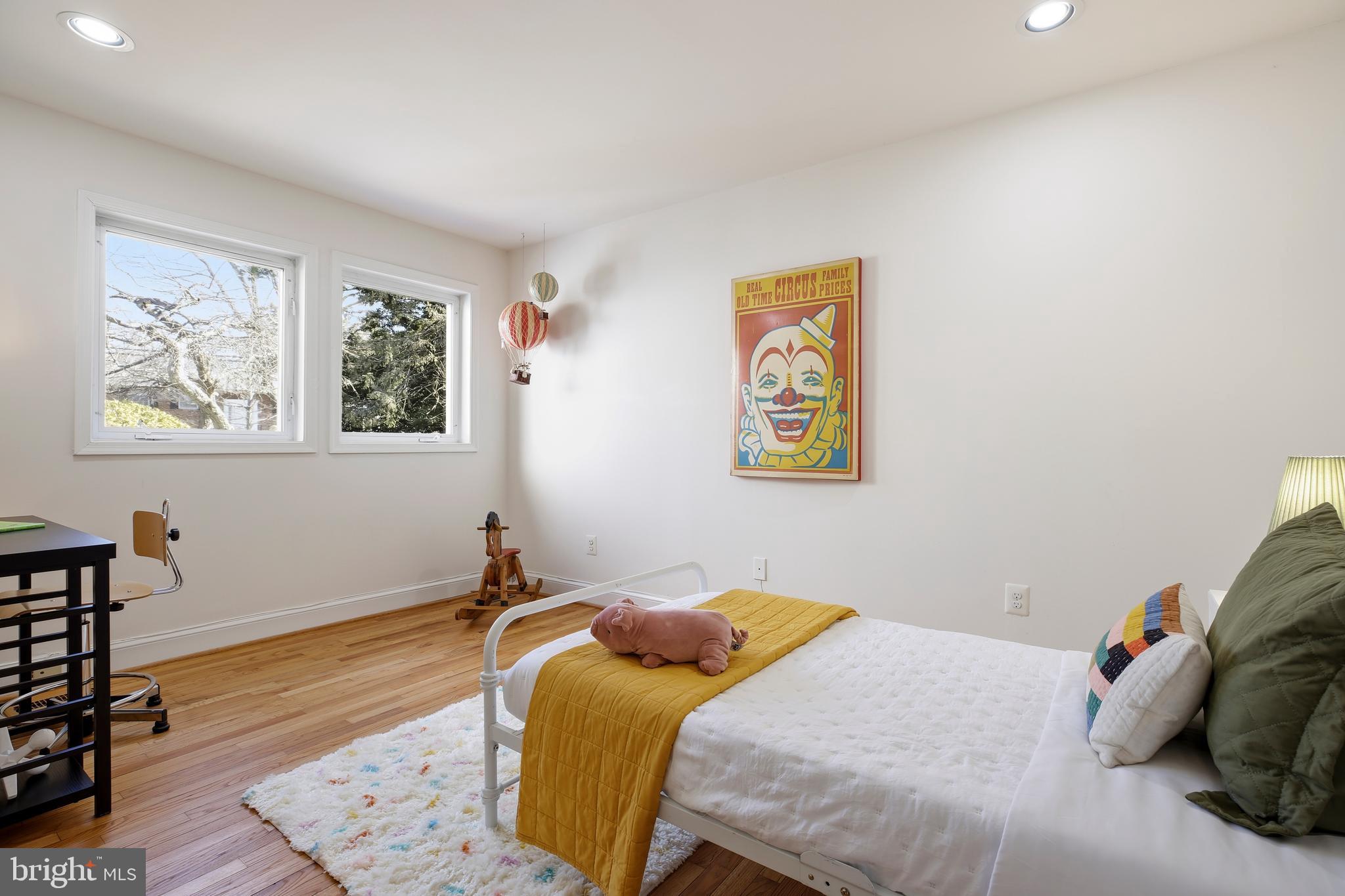 9914 Fernwood Road Bethesda, MD 20817 - Photo 36 of 61 a bedroom with a bed and a window