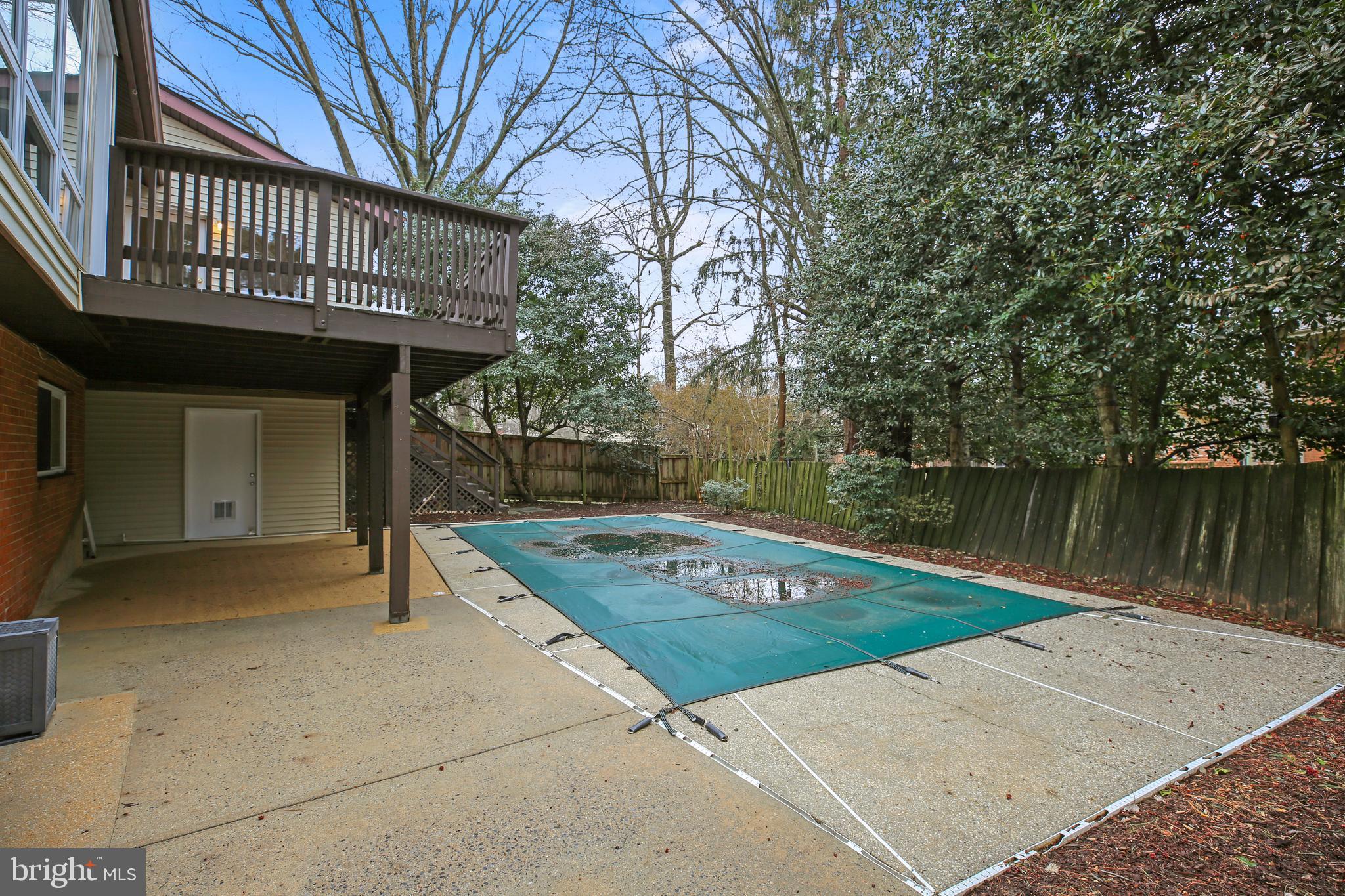9914 Fernwood Road Bethesda, MD 20817 - Photo 41 of 61 a view of a backyard with a barbeque