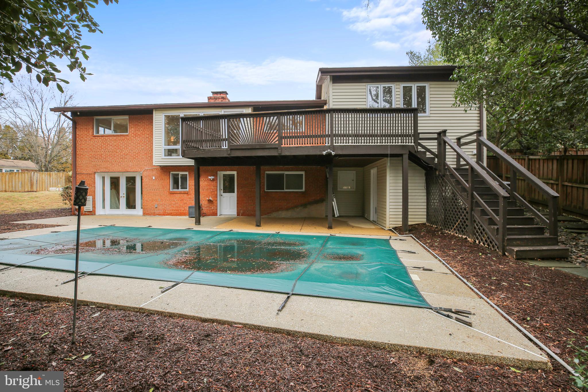 9914 Fernwood Road Bethesda, MD 20817 - Photo 42 of 61 a front view of a house with a yard