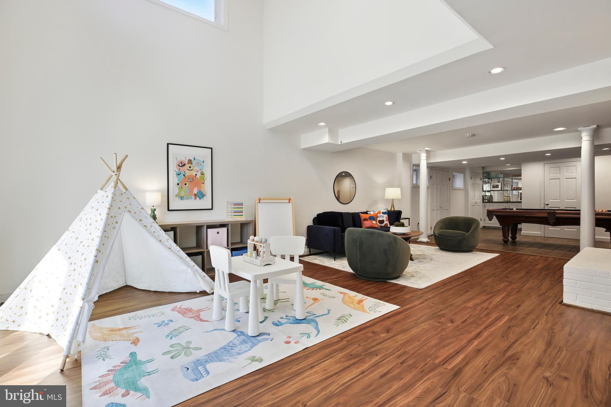9914 Fernwood Road Bethesda, MD 20817 - Photo 45 of 61 a living room with furniture and wooden floor