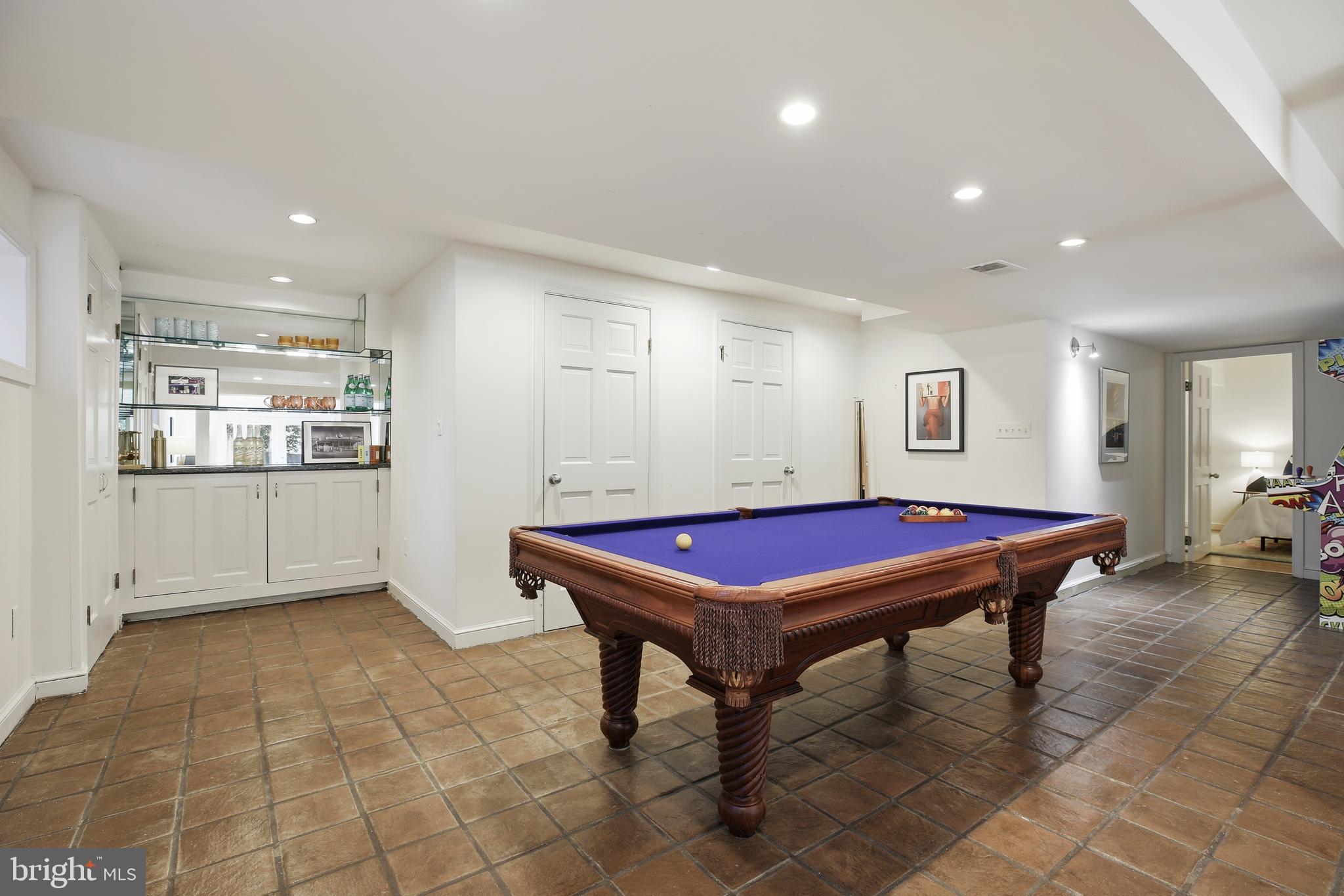 9914 Fernwood Road Bethesda, MD 20817 - Photo 48 of 61 a room with pool table and windows