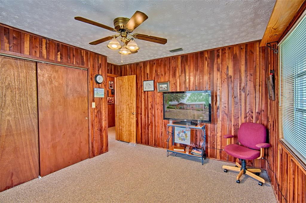 6537 Triest Avenue Keystone Heights, FL 32656 - Photo 20 of 36 a workspace with furniture and window