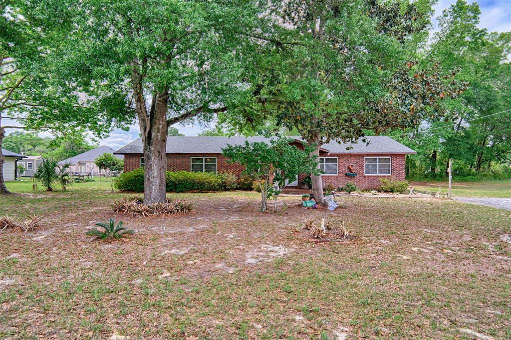 6537 Triest Avenue Keystone Heights, FL 32656 - Photo 31 of 36 a house view with a sitting space and garden