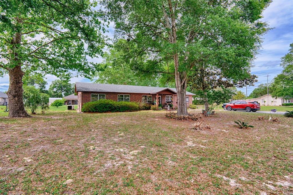 6537 Triest Avenue Keystone Heights, FL 32656 - Photo 33 of 36 a road view with a car parked in front of it