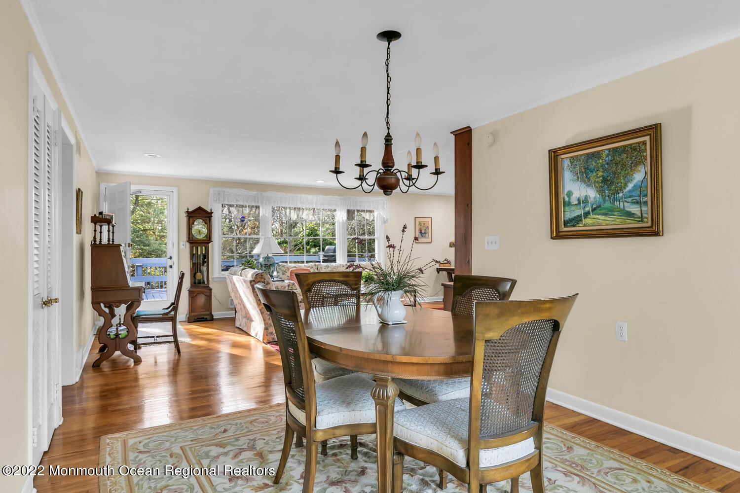 1207 Pond Road Spring Lake Heights, NJ 07762 - Photo 1 of 28 a view of a dining room with furniture window and wooden floor