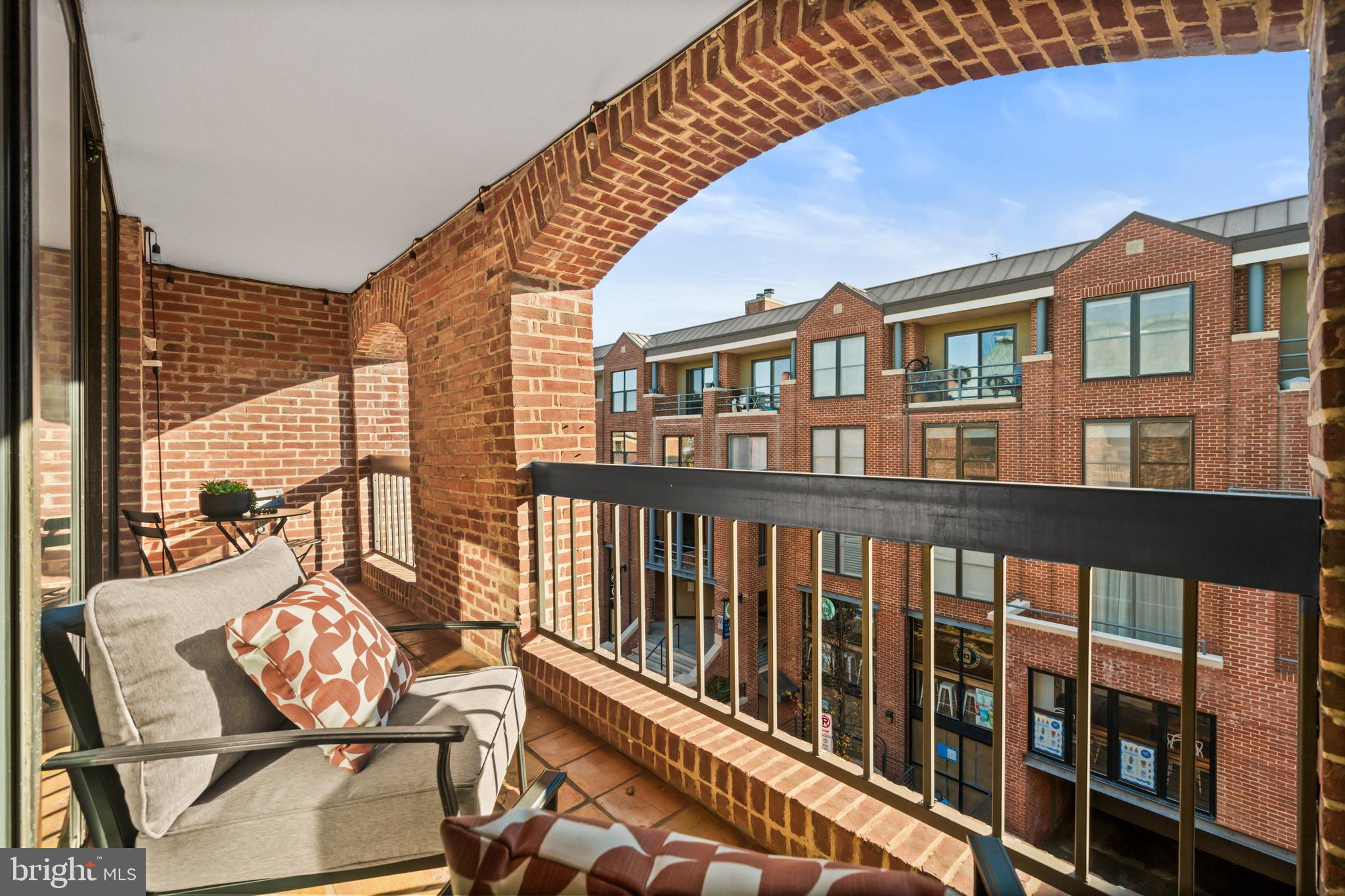 3225 Grace Street Northwest, Unit 219 Washington, DC 20007 - Photo 11 of 45 a view of a balcony with chairs