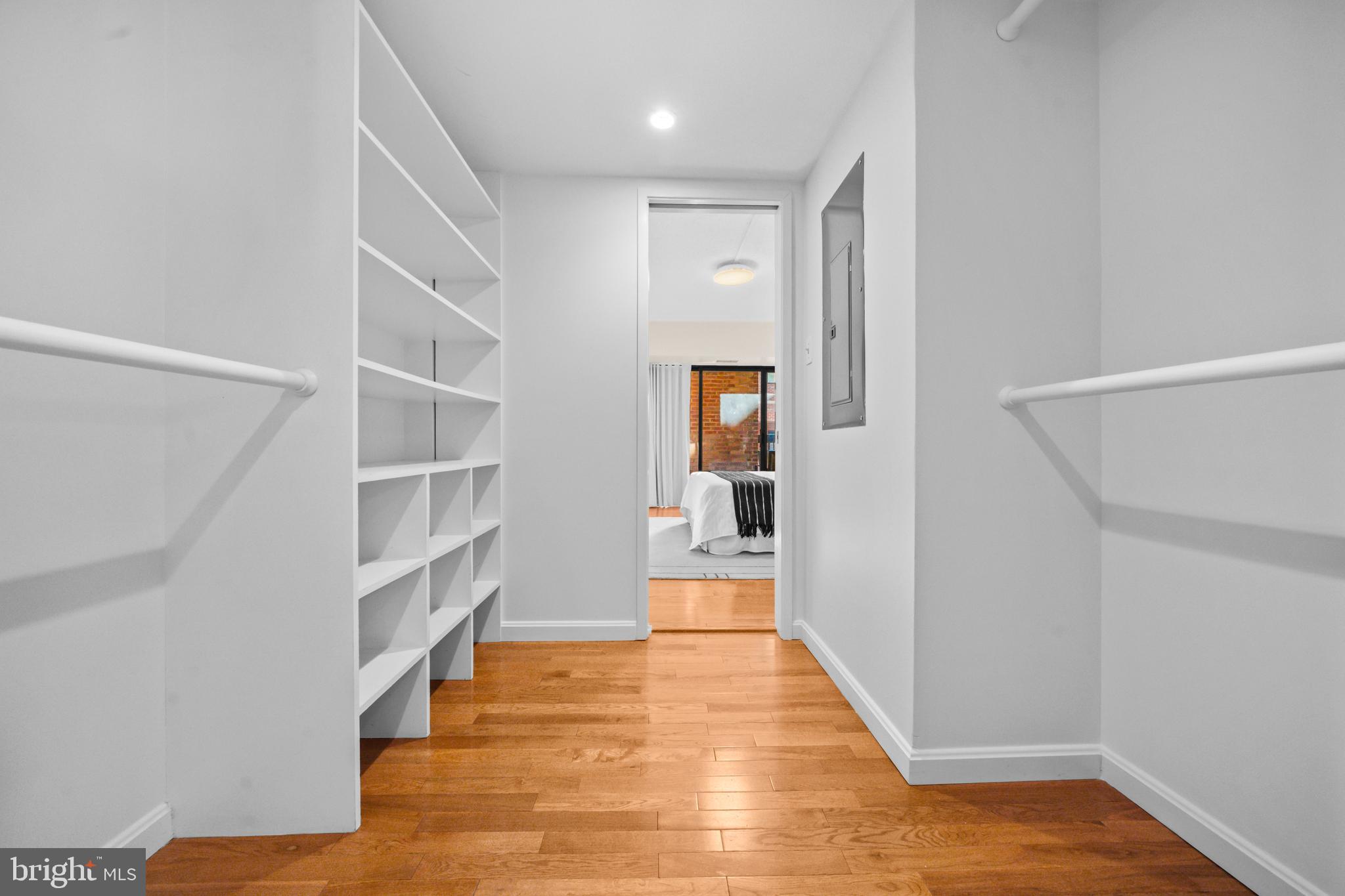3225 Grace Street Northwest, Unit 219 Washington, DC 20007 - Photo 26 of 45 a view of a hallway with wooden floor and entryway