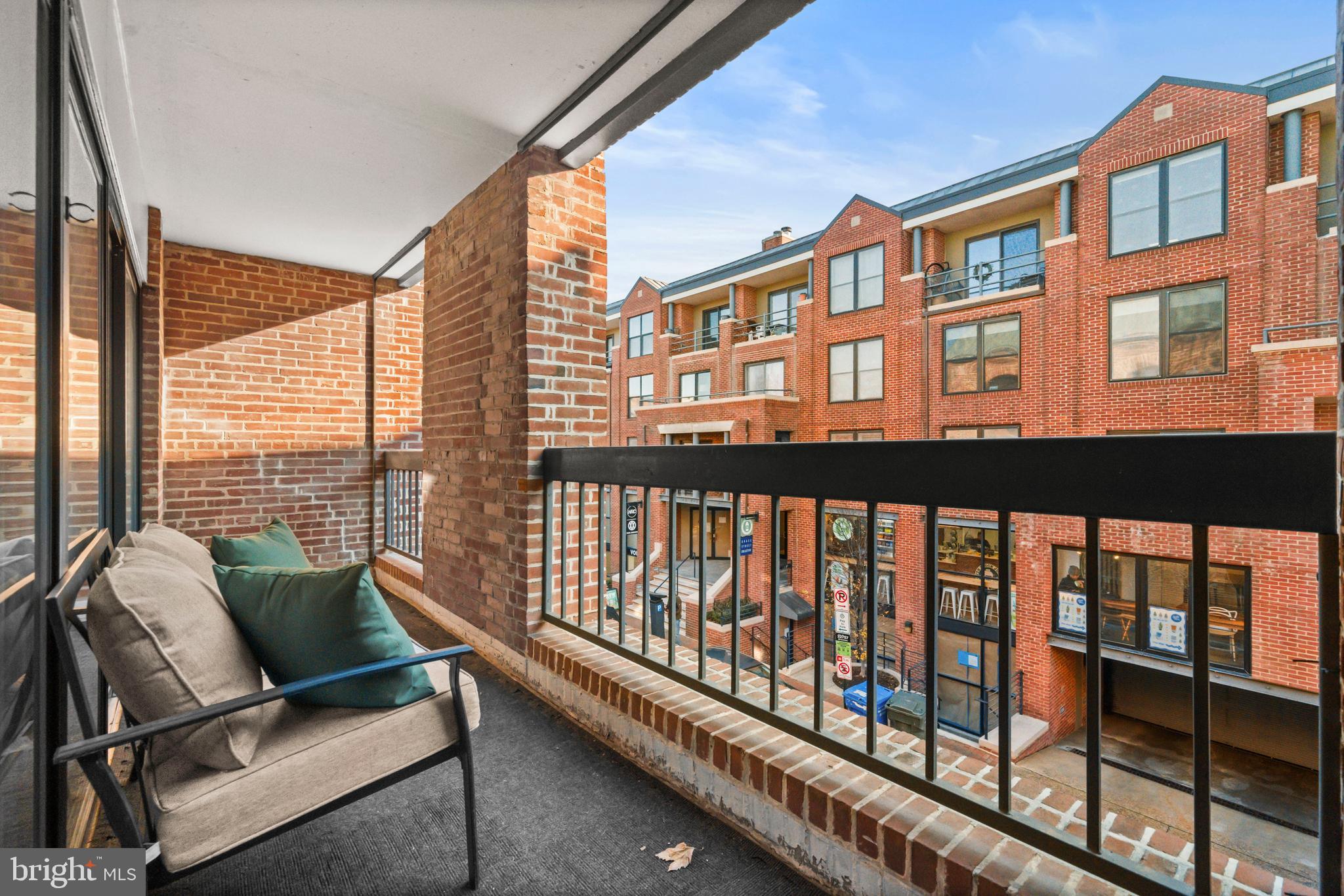 3225 Grace Street Northwest, Unit 219 Washington, DC 20007 - Photo 32 of 44 a balcony view with outdoor seating