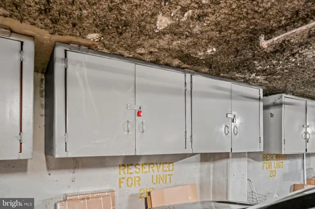 a kitchen with cabinets and window