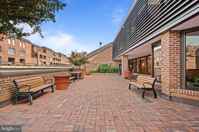 a outdoor space with lounge chair and sitting space